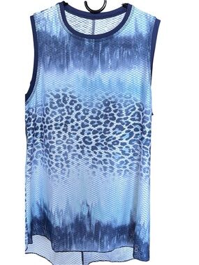 Women's Sofibella sleeveless activewear top can be matched with skort.